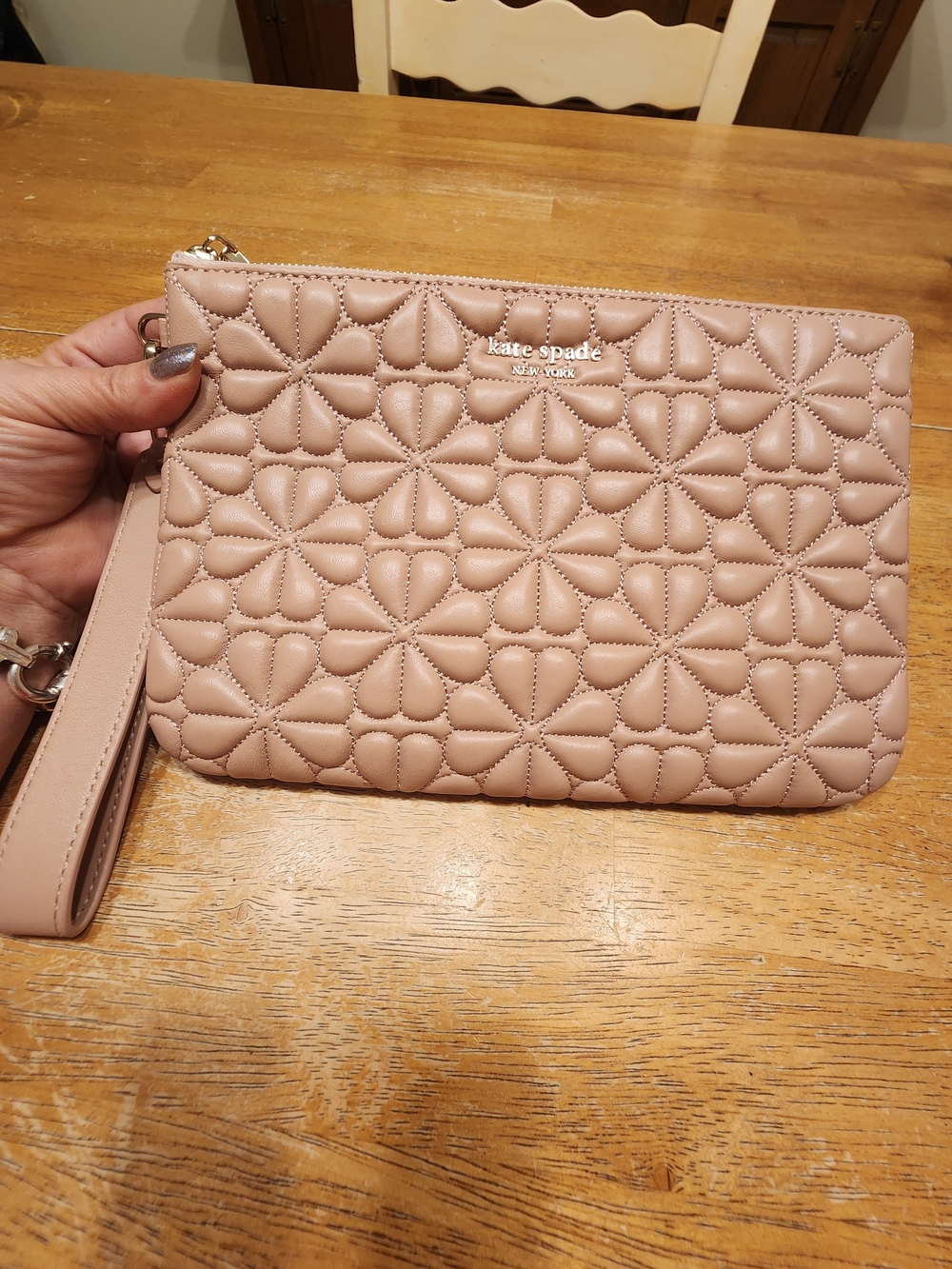 pink-beige Kate Spade Bloom Quilted Pouch wristlet crafted smooth nappa leather